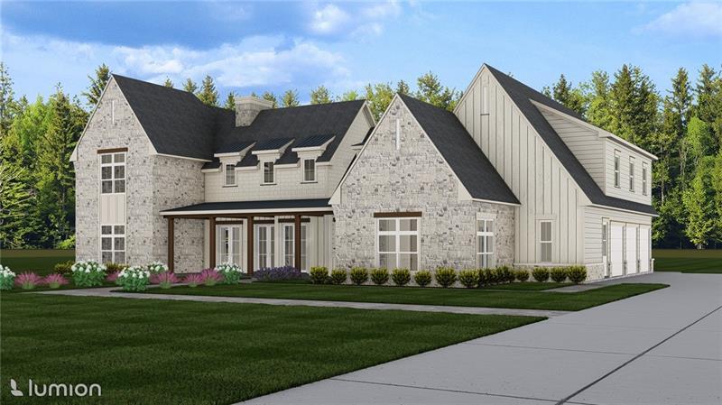 a front view of a house with a garden