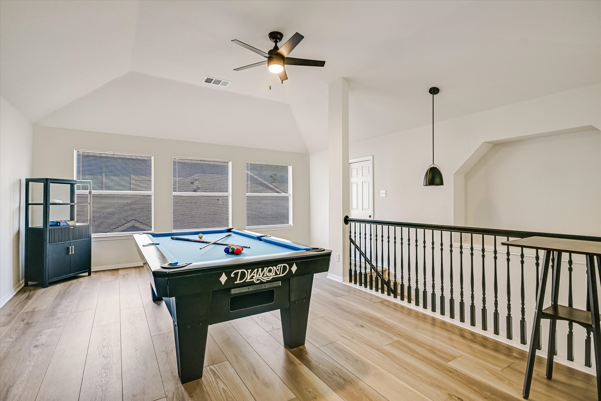 2900 Grimes Ranch Road Austin, TX 78732 - Photo 21 of 38 Newly installed luxury vinyl plank flooring gives the game room a fresh and updated look.