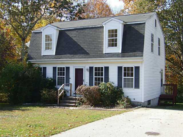 21 Pheasant Run Road Stonington, CT 06378 - Photo 1 of 1 a front view of a house with garden