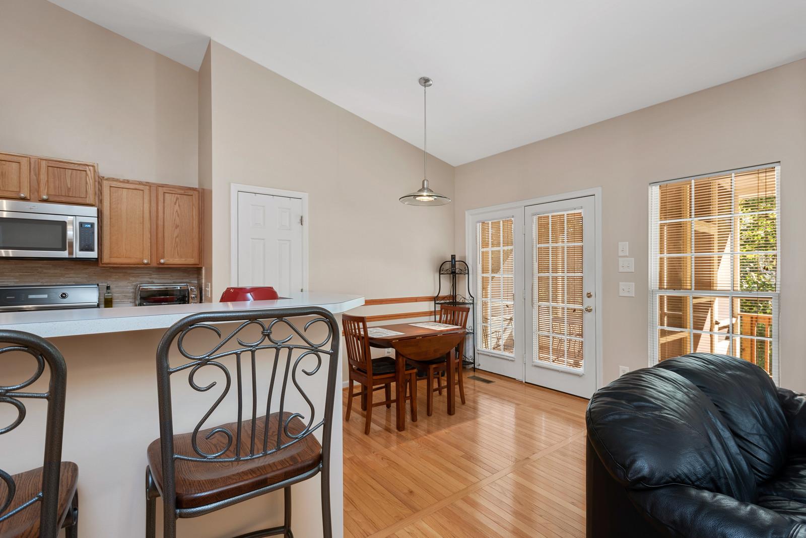 1453 Timber Ridge Circle Nashville, TN 37211 - Photo 12 of 30 The kitchen nook boasts gorgeous wooded views and access to the screened-in porch and deck area