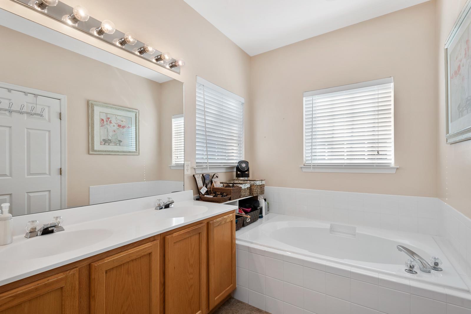 1453 Timber Ridge Circle Nashville, TN 37211 - Photo 19 of 30 The lovely master bath includes a soaking tub, tile flooring and a double vanity
