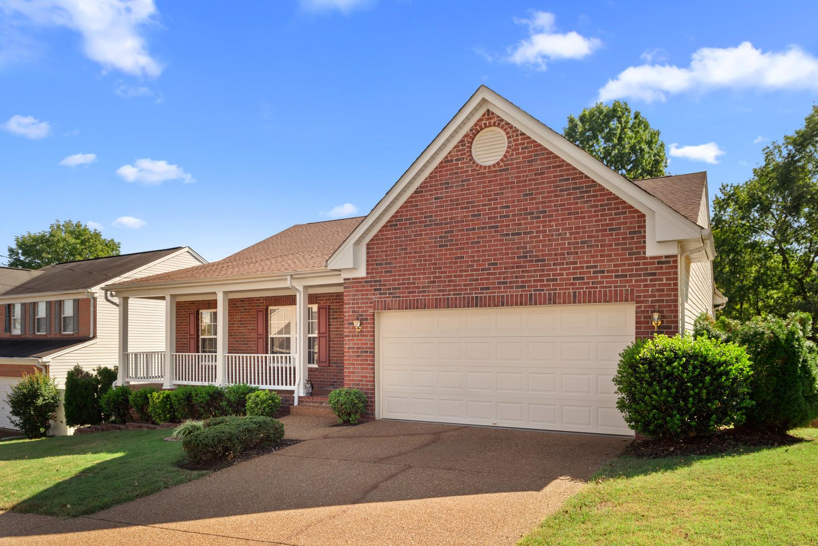 1453 Timber Ridge Circle Nashville, TN 37211 - Photo 3 of 30 Meticulous curb appeal accentuates the brick exterior and the upgraded front porch