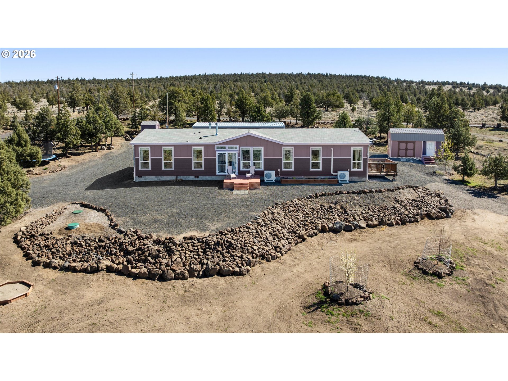 5172 Southeast Oswego Road Prineville, OR 97754 - Photo 46 of 48 a view of a big house with a big yard