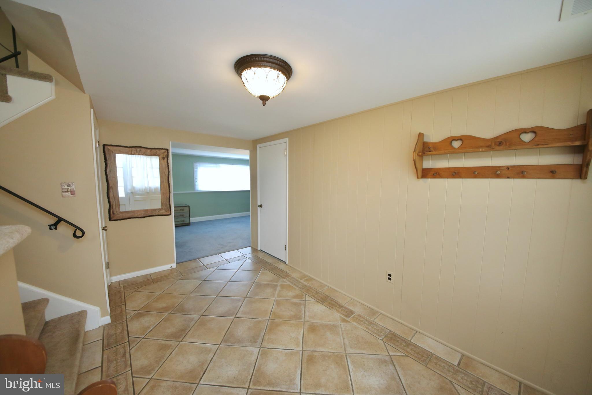 24 Homestead Road Stratford, NJ 08084 - Photo 6 of 39 Foyer has a lovely tile floor