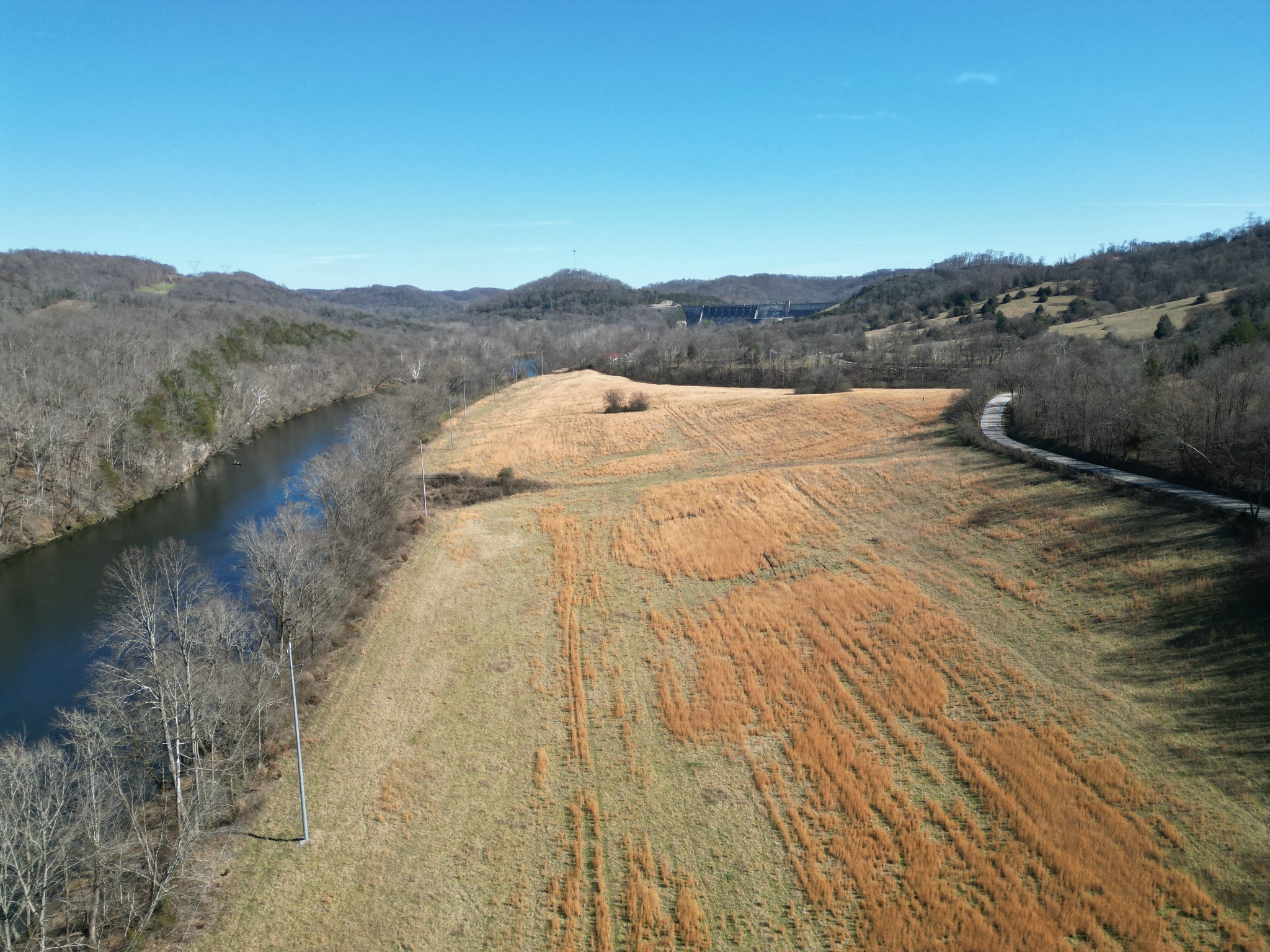 1741 Lancaster Road Lancaster, TN 38569 - Photo 28 of 28 a view of a lake with mountains in the background