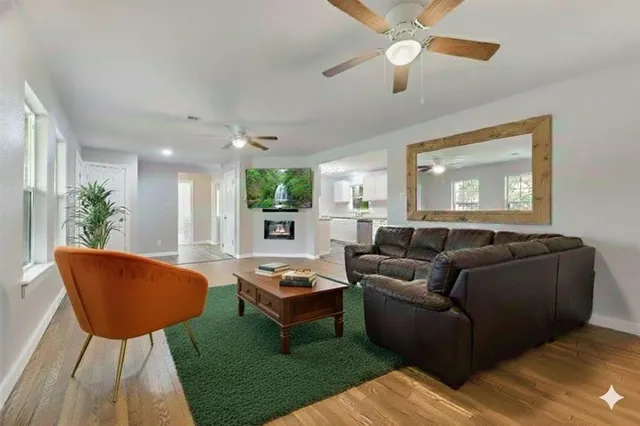 a living room with furniture and a window