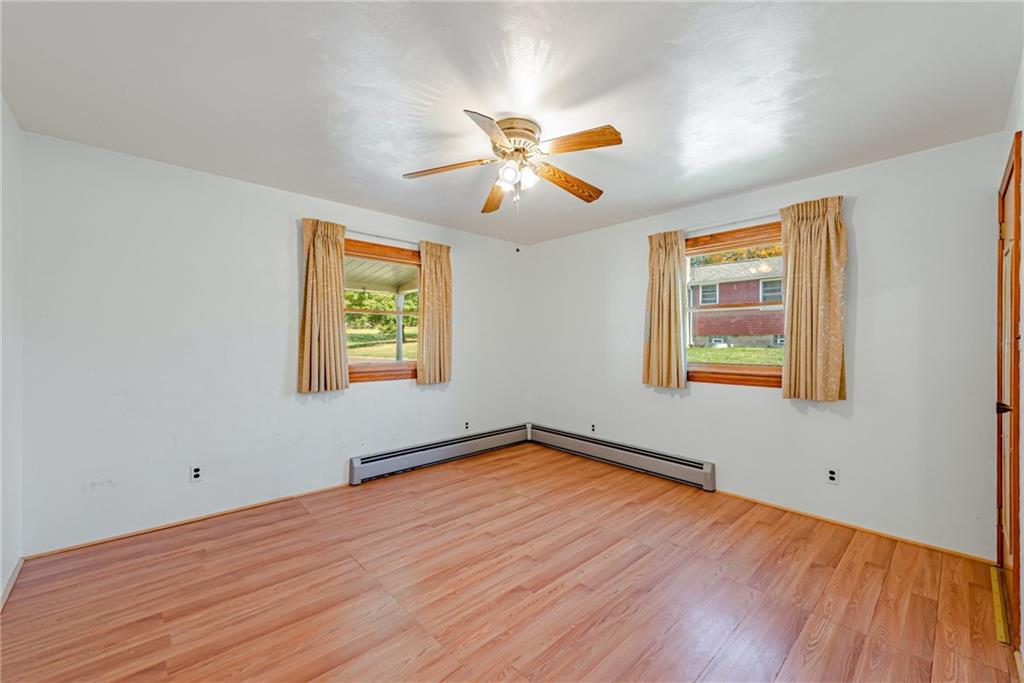 1598 Keystone Park Road New Alexandria, PA 15670 - Photo 16 of 28 a view of empty room with wooden floor and fan