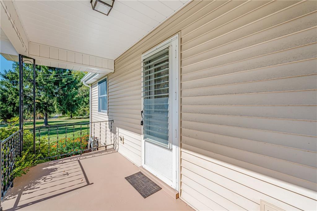 1598 Keystone Park Road New Alexandria, PA 15670 - Photo 2 of 28 a view of a house with a backyard and a garden