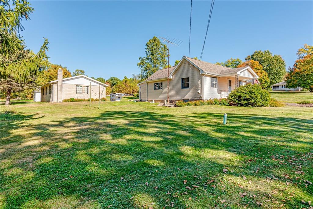 1598 Keystone Park Road New Alexandria, PA 15670 - Photo 22 of 28 a front view of a house with a yard