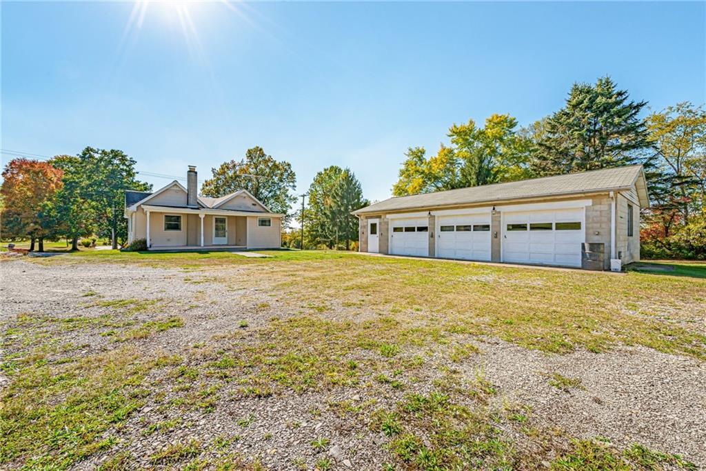 1598 Keystone Park Road New Alexandria, PA 15670 - Photo 24 of 28 a house with trees in front of it