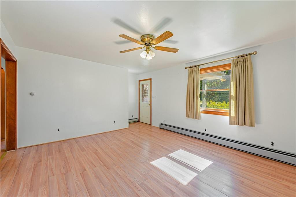 1598 Keystone Park Road New Alexandria, PA 15670 - Photo 4 of 28 a view of an empty room with window and wooden floor