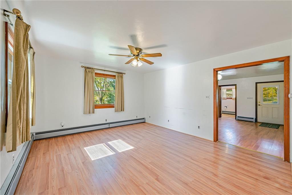 1598 Keystone Park Road New Alexandria, PA 15670 - Photo 5 of 28 wooden floor in an empty room with a window