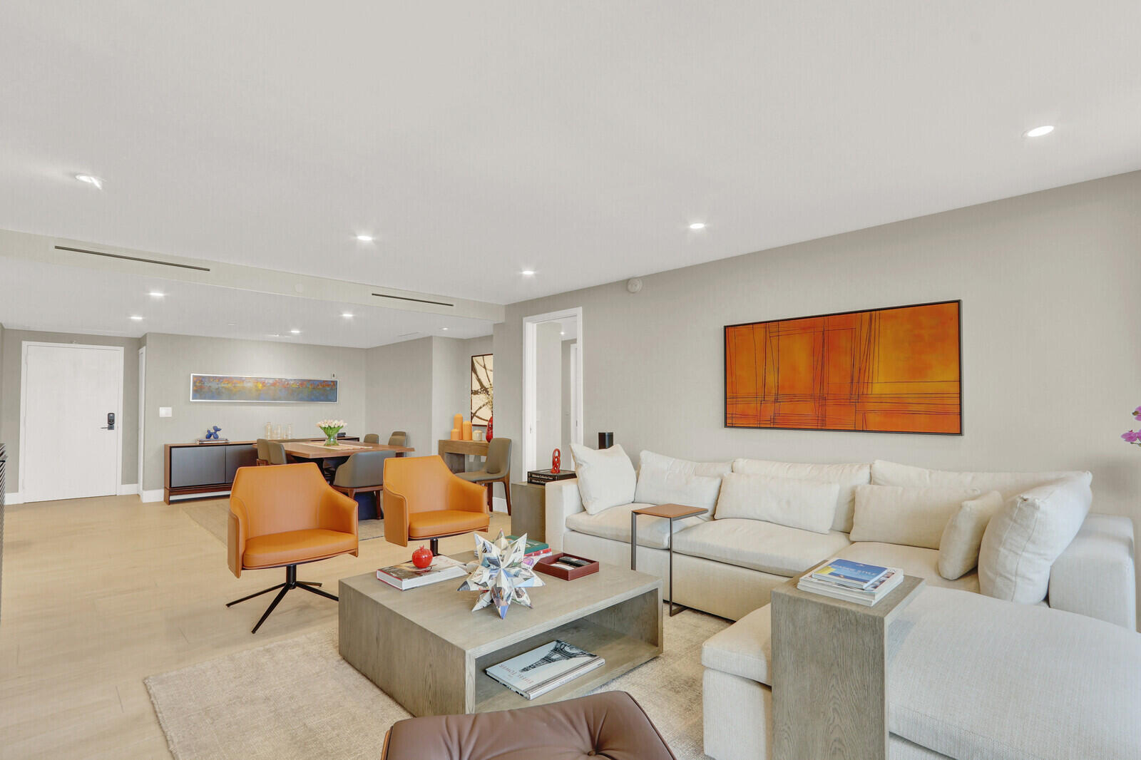 4201 North Ocean Boulevard, Unit C1202 Boca Raton, FL 33431 - Photo 21 of 47 a living room with furniture and kitchen view with wooden floor