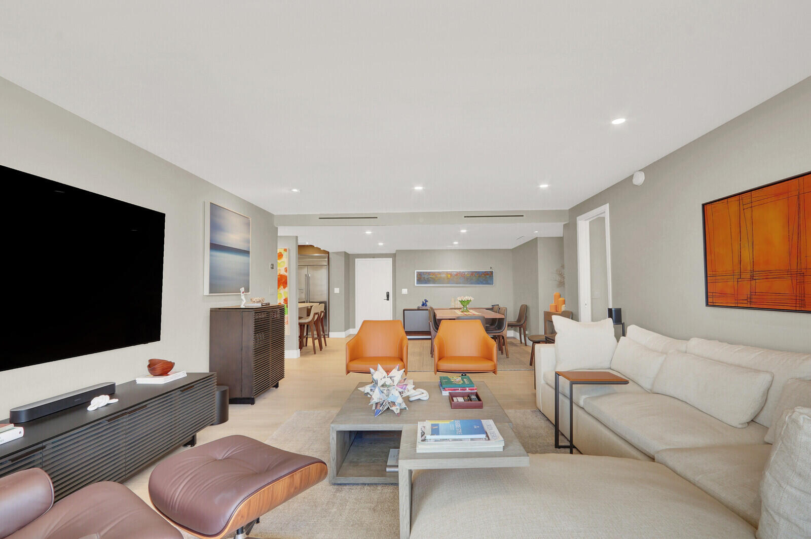 4201 North Ocean Boulevard, Unit C1202 Boca Raton, FL 33431 - Photo 22 of 47 a living room with furniture and a flat screen tv