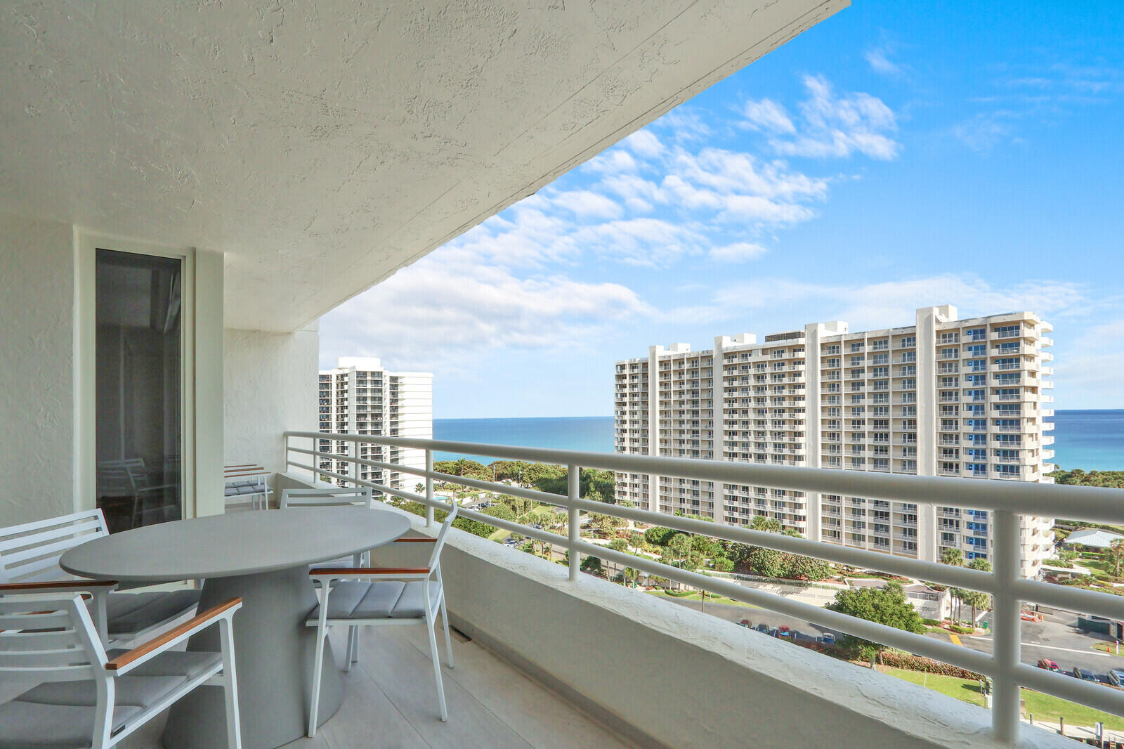 4201 North Ocean Boulevard, Unit C1202 Boca Raton, FL 33431 - Photo 43 of 47 a view of a city from a balcony
