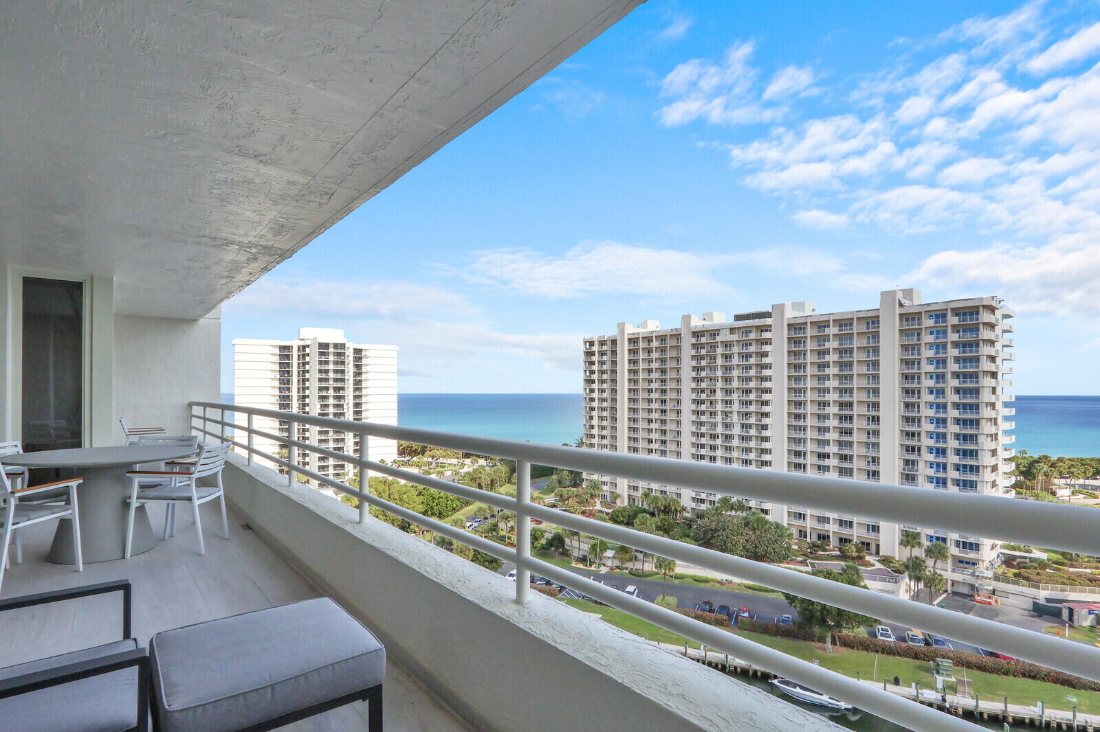 4201 North Ocean Boulevard, Unit C1202 Boca Raton, FL 33431 - Photo 44 of 47 a view of a city from a balcony