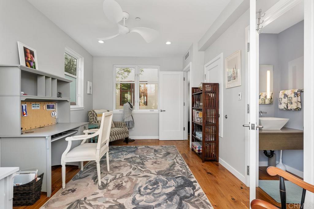 215 2nd Street, Unit 101 Encinitas, CA 92024 - Photo 22 of 47 a workspace with furniture and window