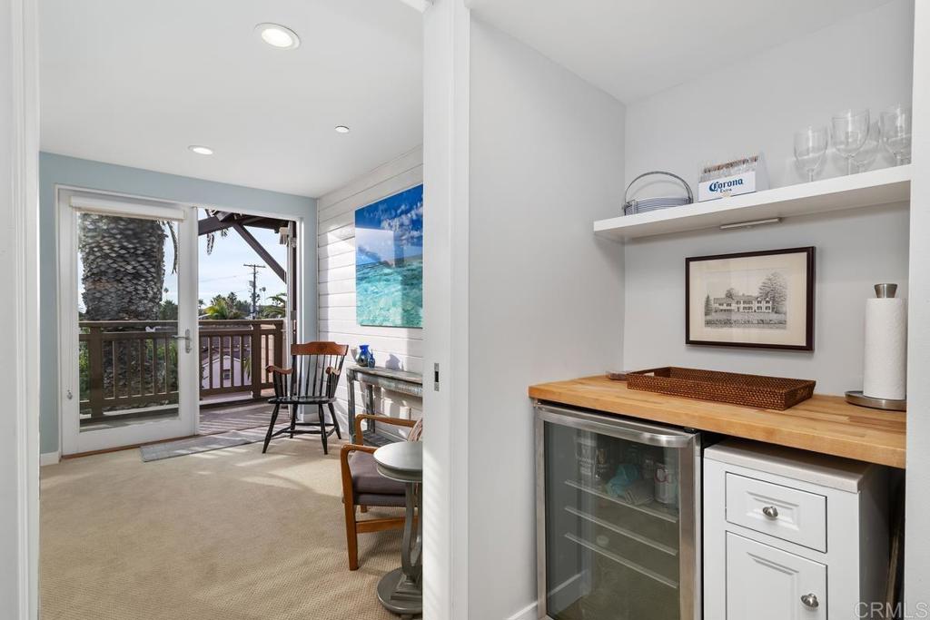 215 2nd Street, Unit 101 Encinitas, CA 92024 - Photo 28 of 47 a view of a livingroom with furniture and window