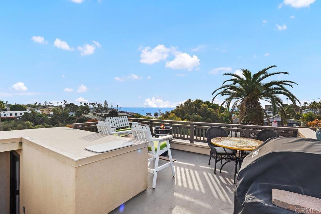 215 2nd Street, Unit 101 Encinitas, CA 92024 - Photo 32 of 47 a view of roof deck with seating space
