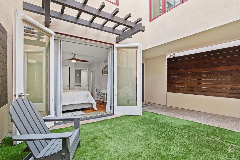 215 2nd Street, Unit 101 Encinitas, CA 92024 - Photo 41 of 47 a view of an entryway with a house