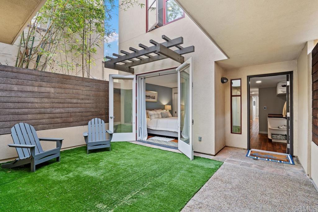 215 2nd Street, Unit 101 Encinitas, CA 92024 - Photo 42 of 47 a view of a house with backyard