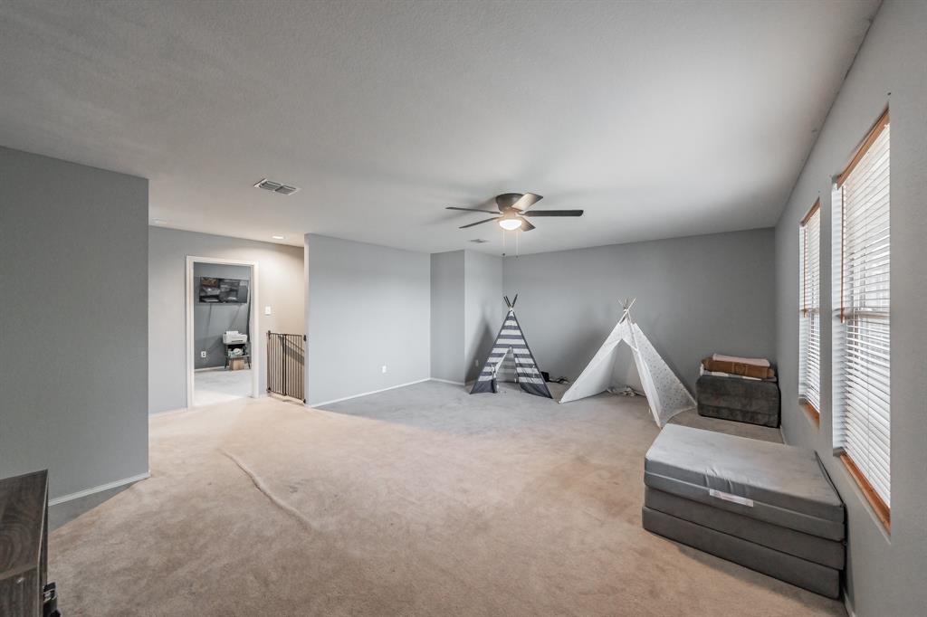 12617 Kingsgate Drive Rhome, TX 76078 - Photo 25 of 39 a view of a livingroom with furniture and windows