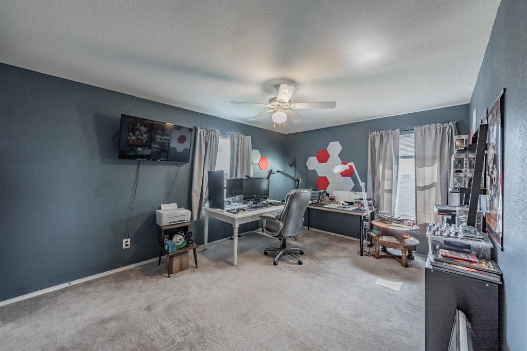 12617 Kingsgate Drive Rhome, TX 76078 - Photo 32 of 39 a view of a workspace with furniture and a livingroom