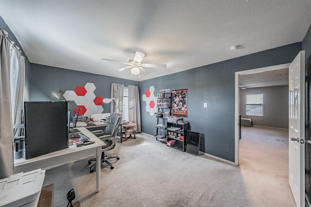 12617 Kingsgate Drive Rhome, TX 76078 - Photo 33 of 39 a view of a room with gym equipment