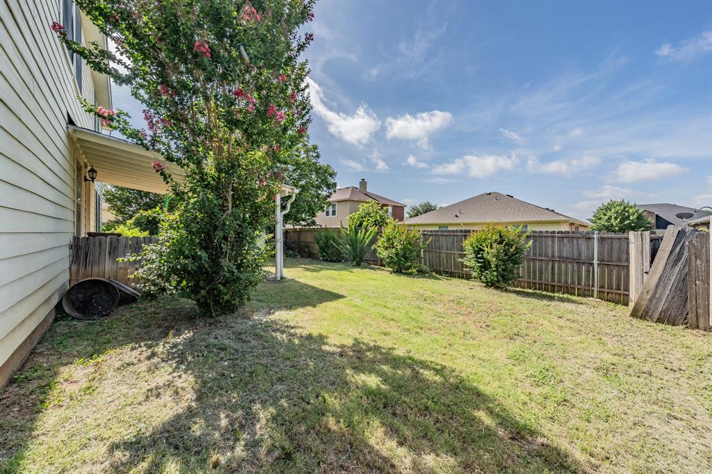 12617 Kingsgate Drive Rhome, TX 76078 - Photo 38 of 39 a view of a backyard