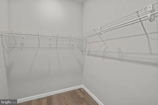 a view of a room with racks on the wall