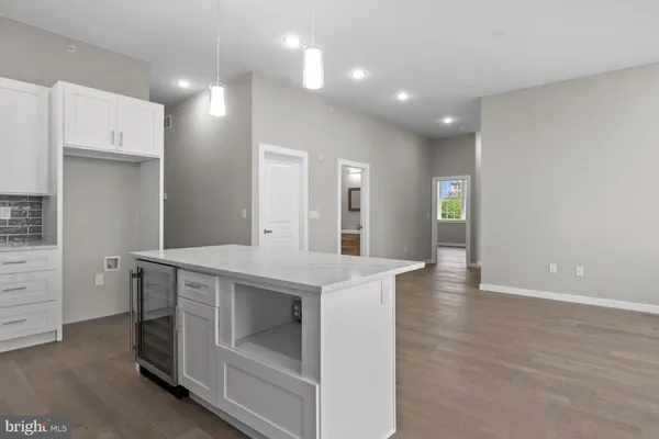 a kitchen with a stove and a sink