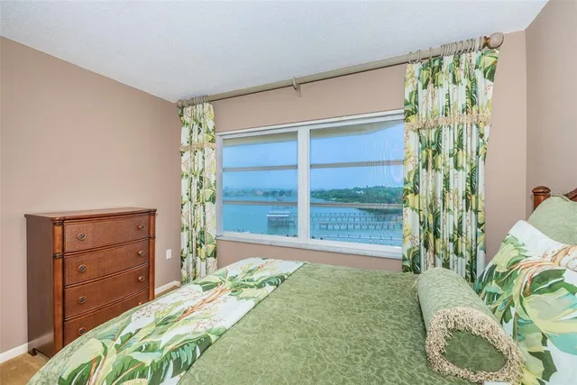 a view of a swimming pool and a chairs