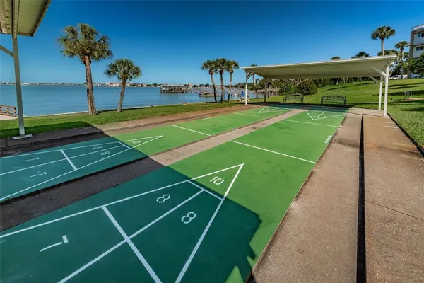 an aerial view of residential house with outdoor space and swimming pool