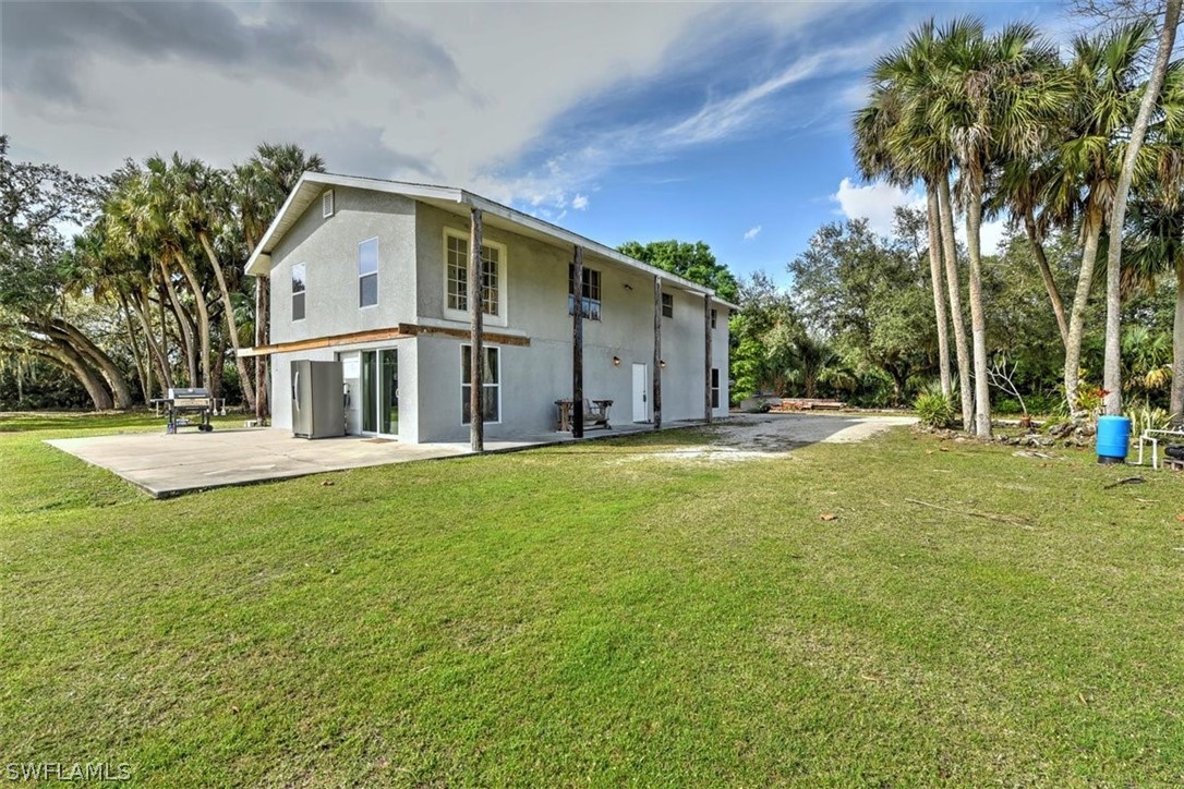 5320 Obannon Road Fort Myers, FL 33905 - Photo 23 of 28 a front view of house with yard and green space