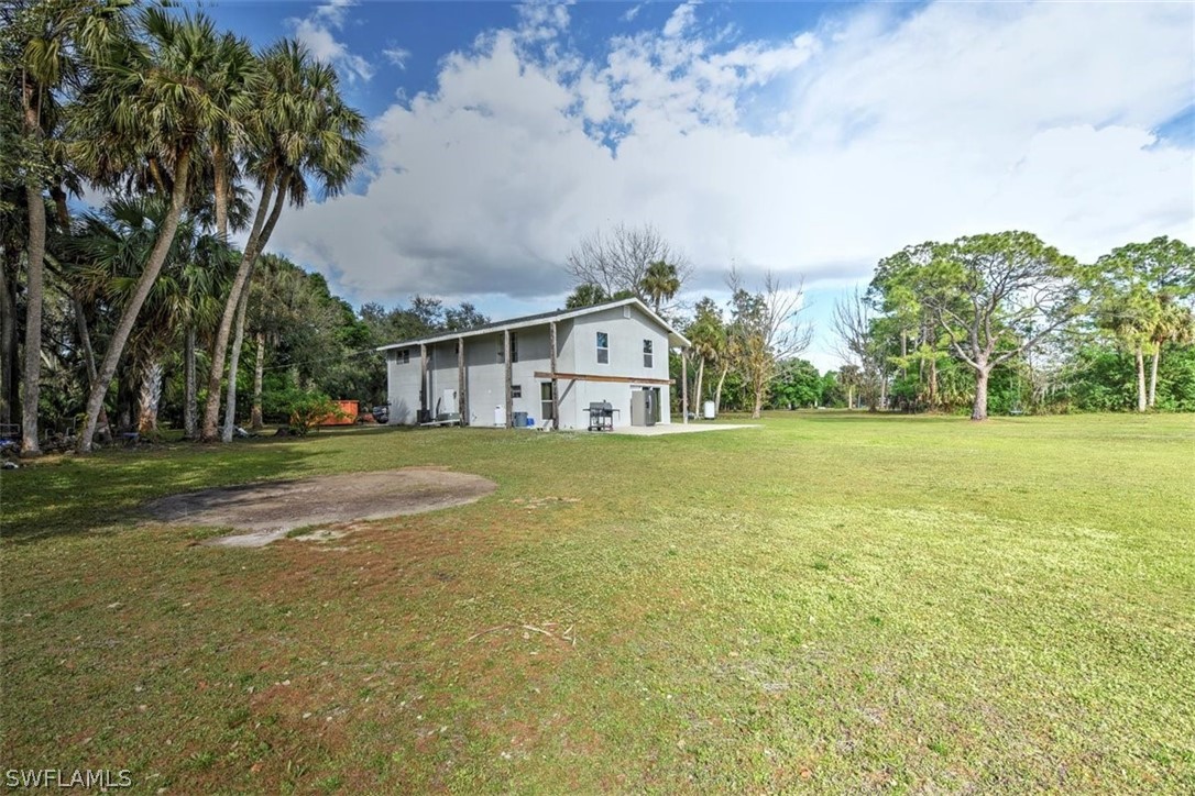 5320 Obannon Road Fort Myers, FL 33905 - Photo 28 of 28 a house view with swimming pool in front of it