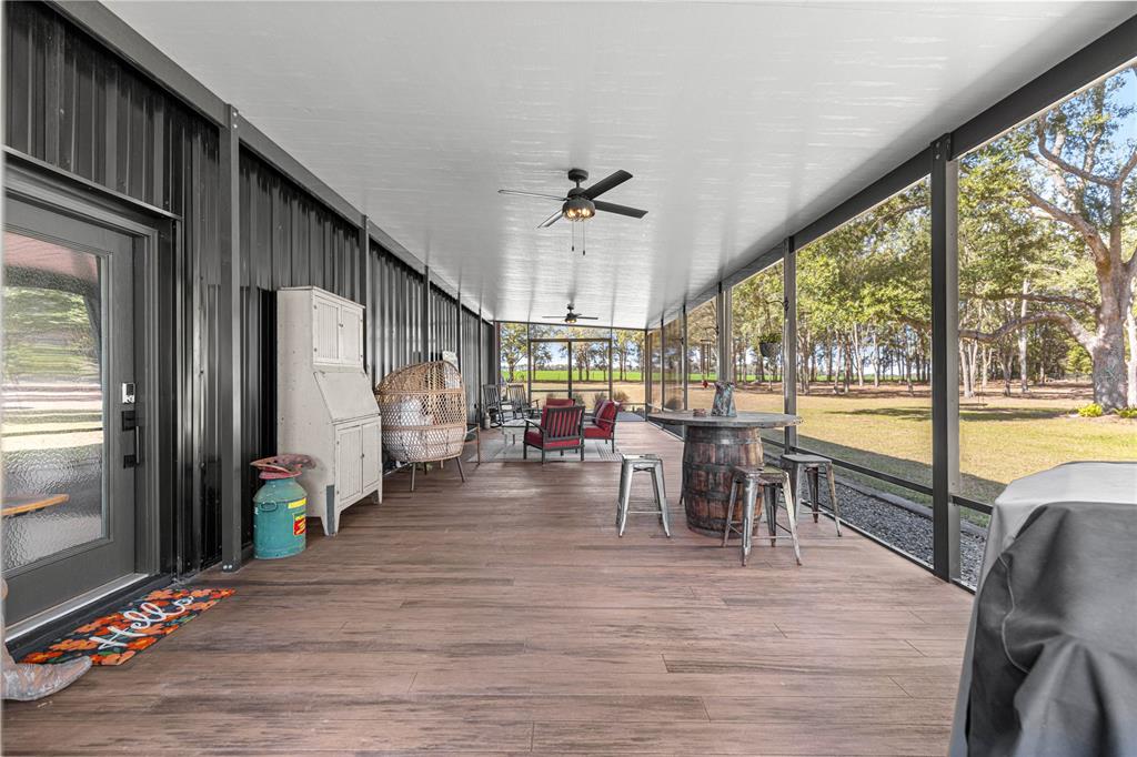 4120 Southwest 199th Court Dunnellon, FL 34431 - Photo 21 of 82 a view of a dining room with furniture window and wooden floor