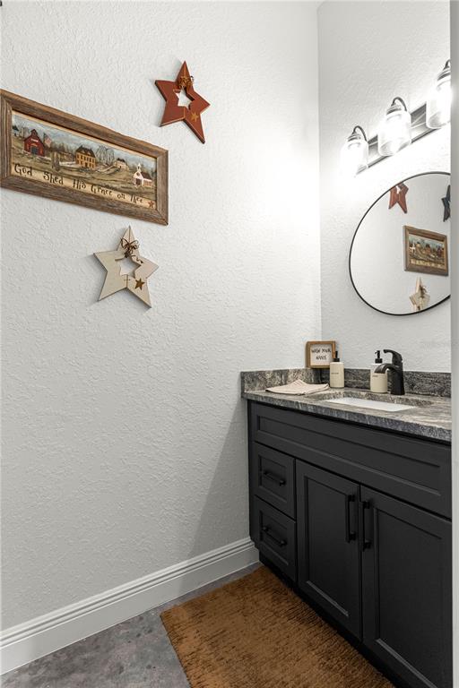 4120 Southwest 199th Court Dunnellon, FL 34431 - Photo 26 of 82 a bathroom with a sink and a mirror