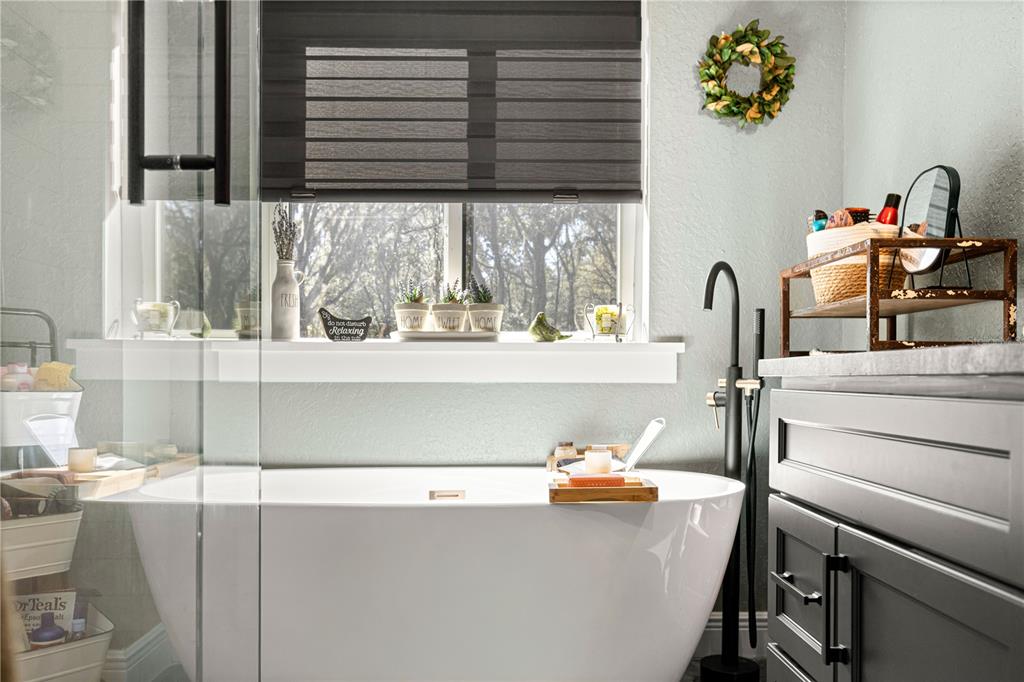 4120 Southwest 199th Court Dunnellon, FL 34431 - Photo 46 of 82 a view of a kitchen with kitchen island a sink wooden floor and a large window