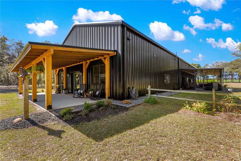 4120 Southwest 199th Court Dunnellon, FL 34431 - Photo 5 of 82 a view of a house with entertaining space