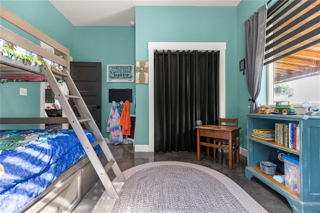 4120 Southwest 199th Court Dunnellon, FL 34431 - Photo 55 of 82 a view of a bedroom with furniture and a window