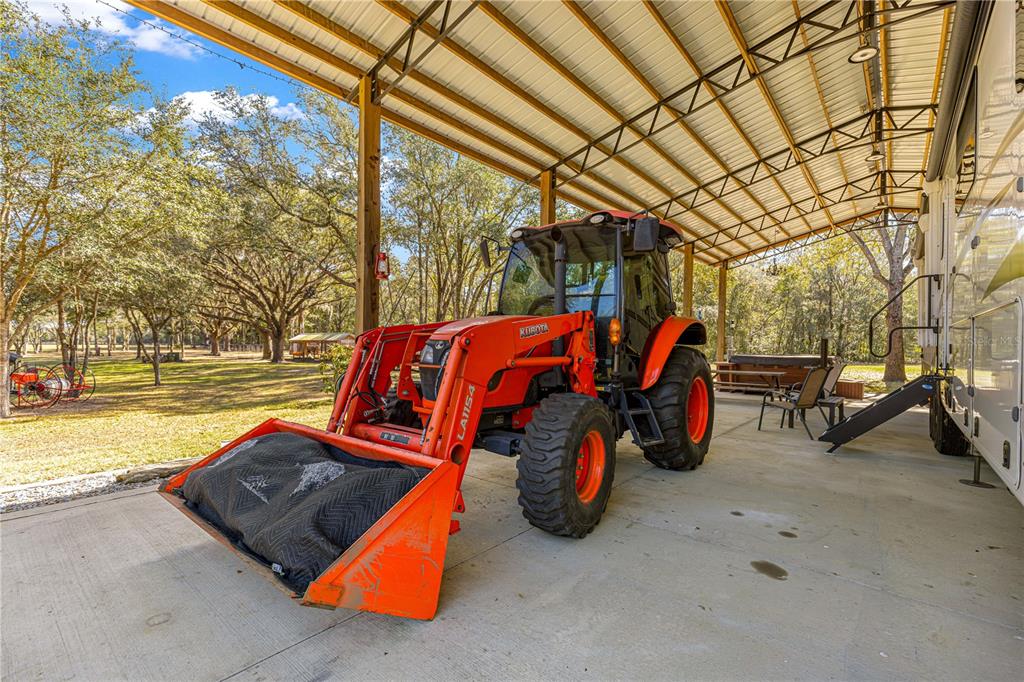 4120 Southwest 199th Court Dunnellon, FL 34431 - Photo 65 of 82 a utility room with blue lights and furniture