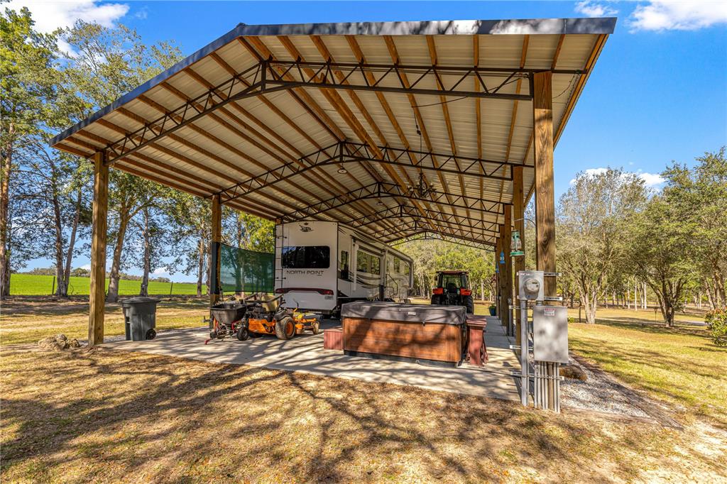 4120 Southwest 199th Court Dunnellon, FL 34431 - Photo 68 of 82 a view of a swimming pool with a patio
