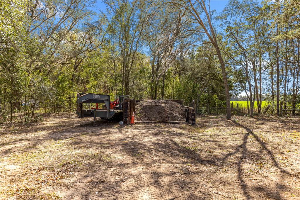 4120 Southwest 199th Court Dunnellon, FL 34431 - Photo 70 of 82 a view of a yard with car parked