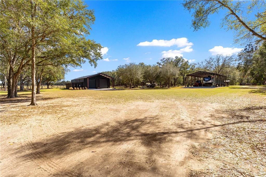 4120 Southwest 199th Court Dunnellon, FL 34431 - Photo 72 of 82 a view of an outdoor space and swimming pool