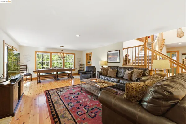 a living room with furniture and a table