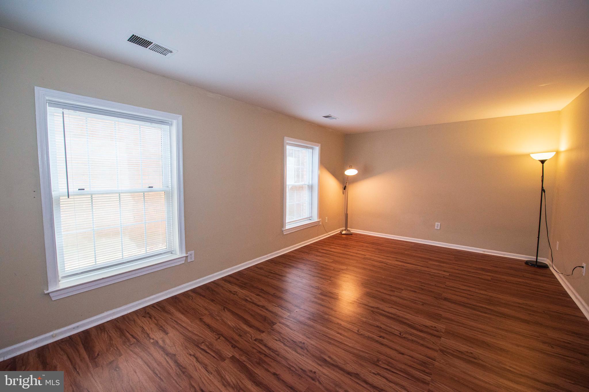 10708 Kings Riding Way, Unit T219 Rockville, MD 20852 - Photo 11 of 20 Primary bedroom with room for a king bed & a desk