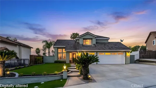 a large kitchen with stainless steel appliances kitchen island granite countertop a large island in the center
