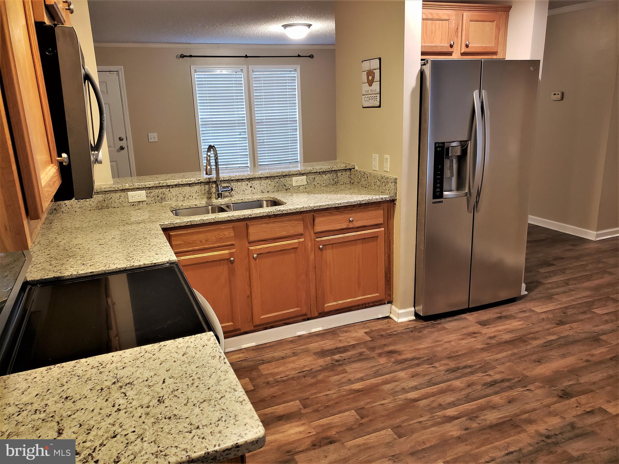 7515 Tate Road Ruther Glen, VA 22546 - Photo 11 of 28 with your updated granite countertops