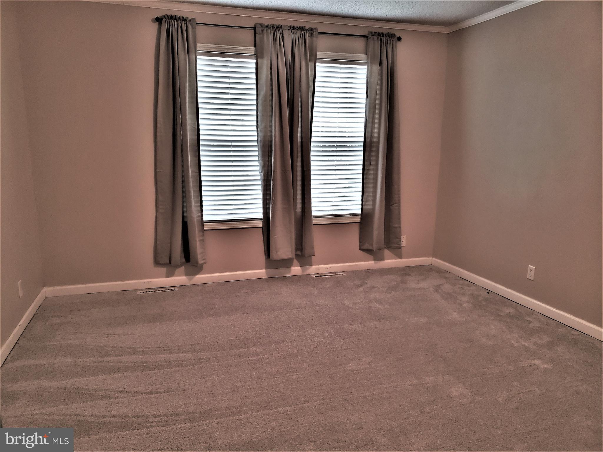 7515 Tate Road Ruther Glen, VA 22546 - Photo 28 of 28 split bedroom floor plan allows for privacy.