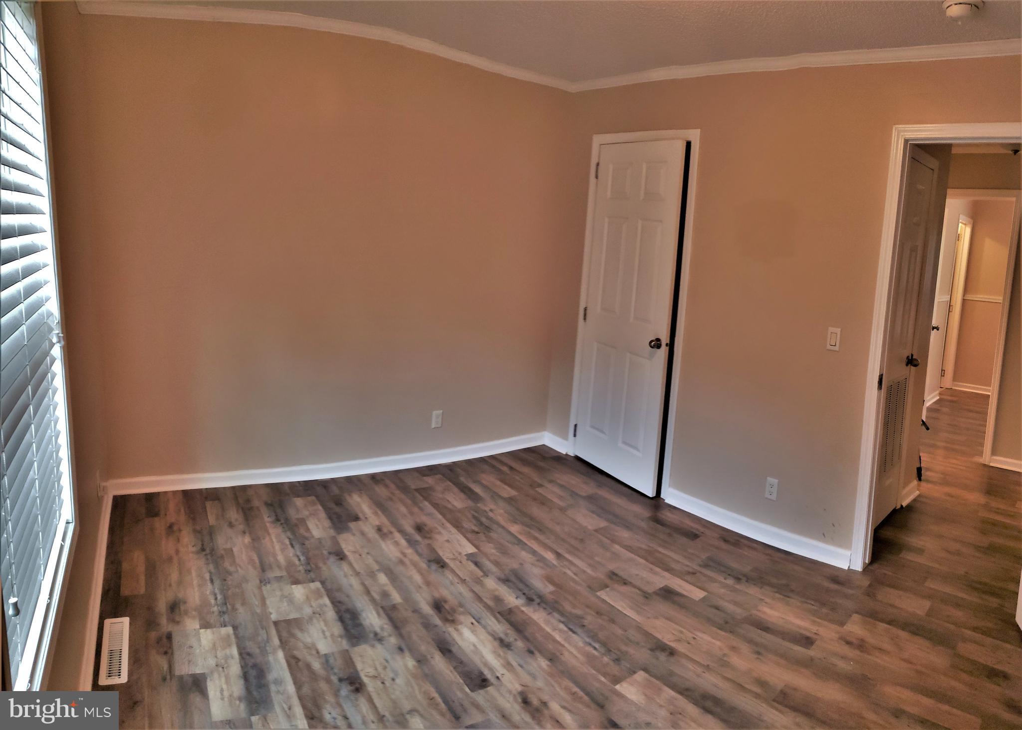 7515 Tate Road Ruther Glen, VA 22546 - Photo 18 of 28 Bedroom 2 w/the beautiful floors